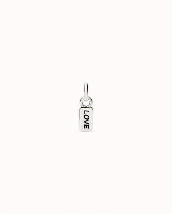 Sterling silver-plated charm with the word “love”